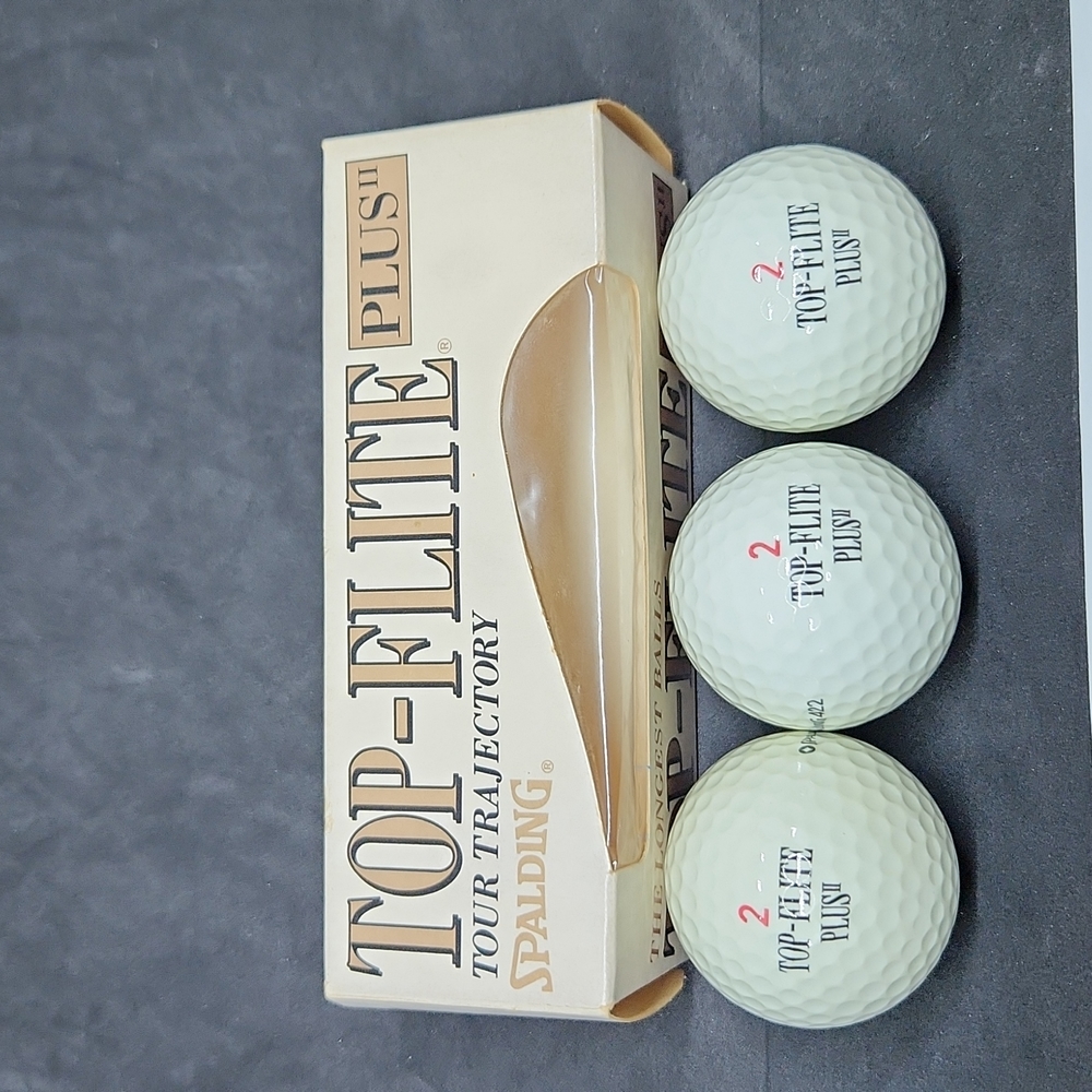Spalding top flite plus 2 golf balls
